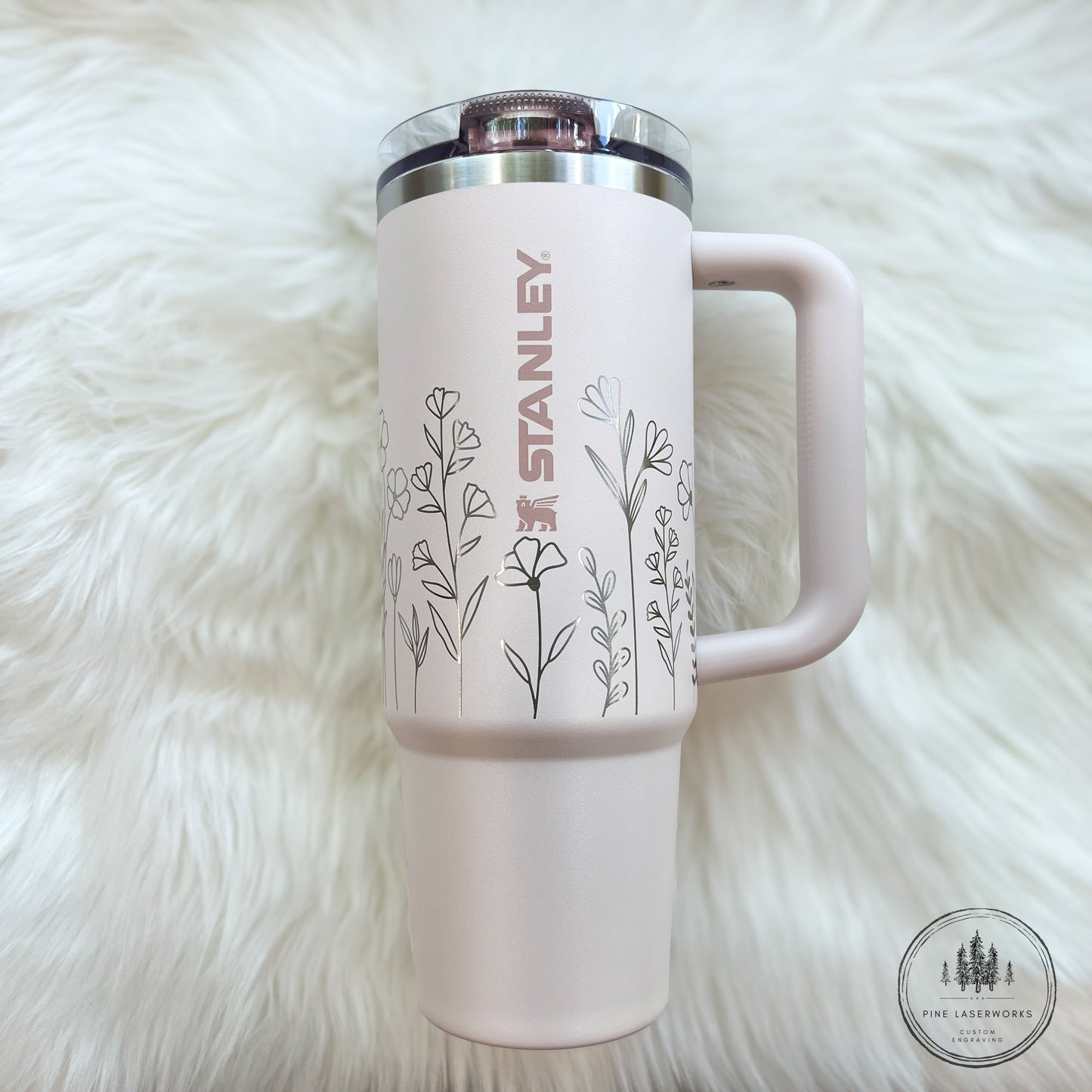 Personalized Floral Stanley ProTour 30oz or 40oz Engraved Tumbler - Pine LaserworksPink Stanley mug with floral designs on a white fur background