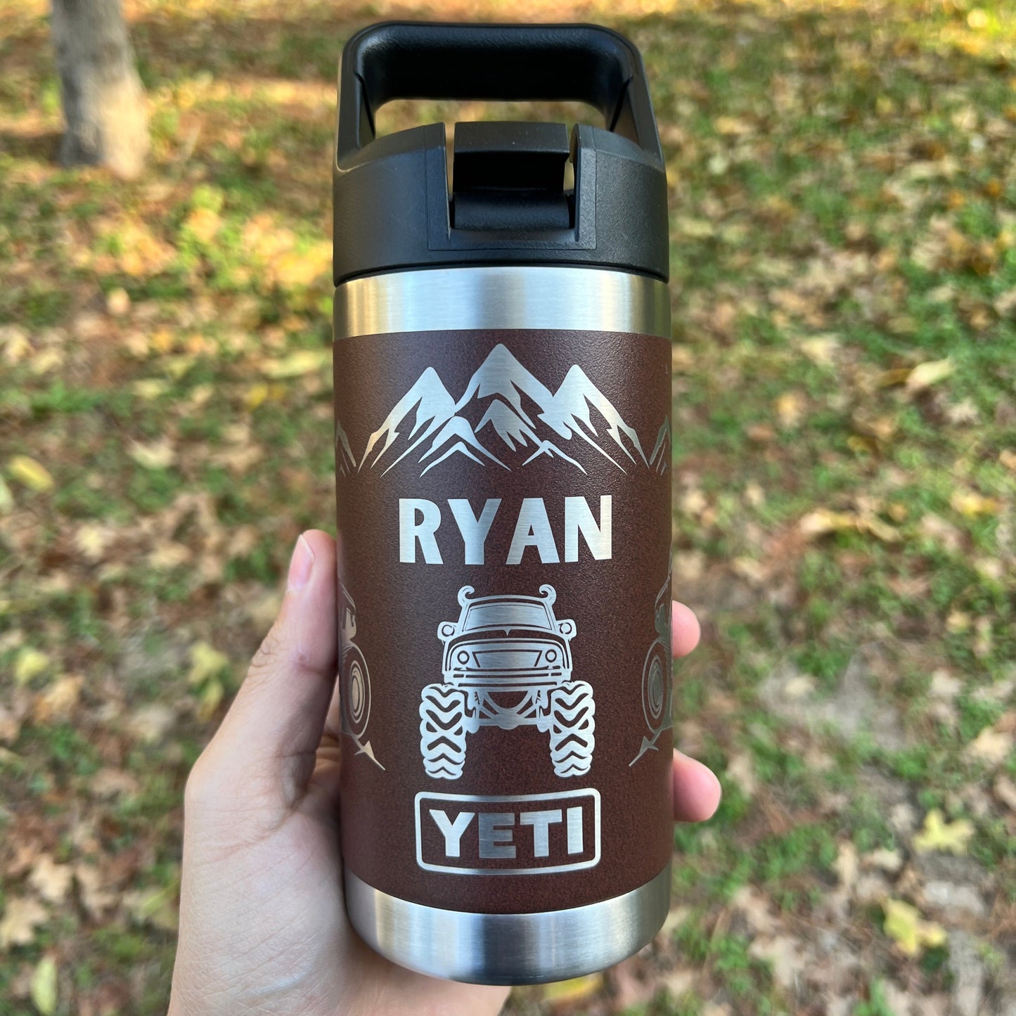 Personalized Kids Yeti 12 oz Water Bottle 12 Design Options - Pine LaserworksYETI mug with personalized name held in a hand outdoors