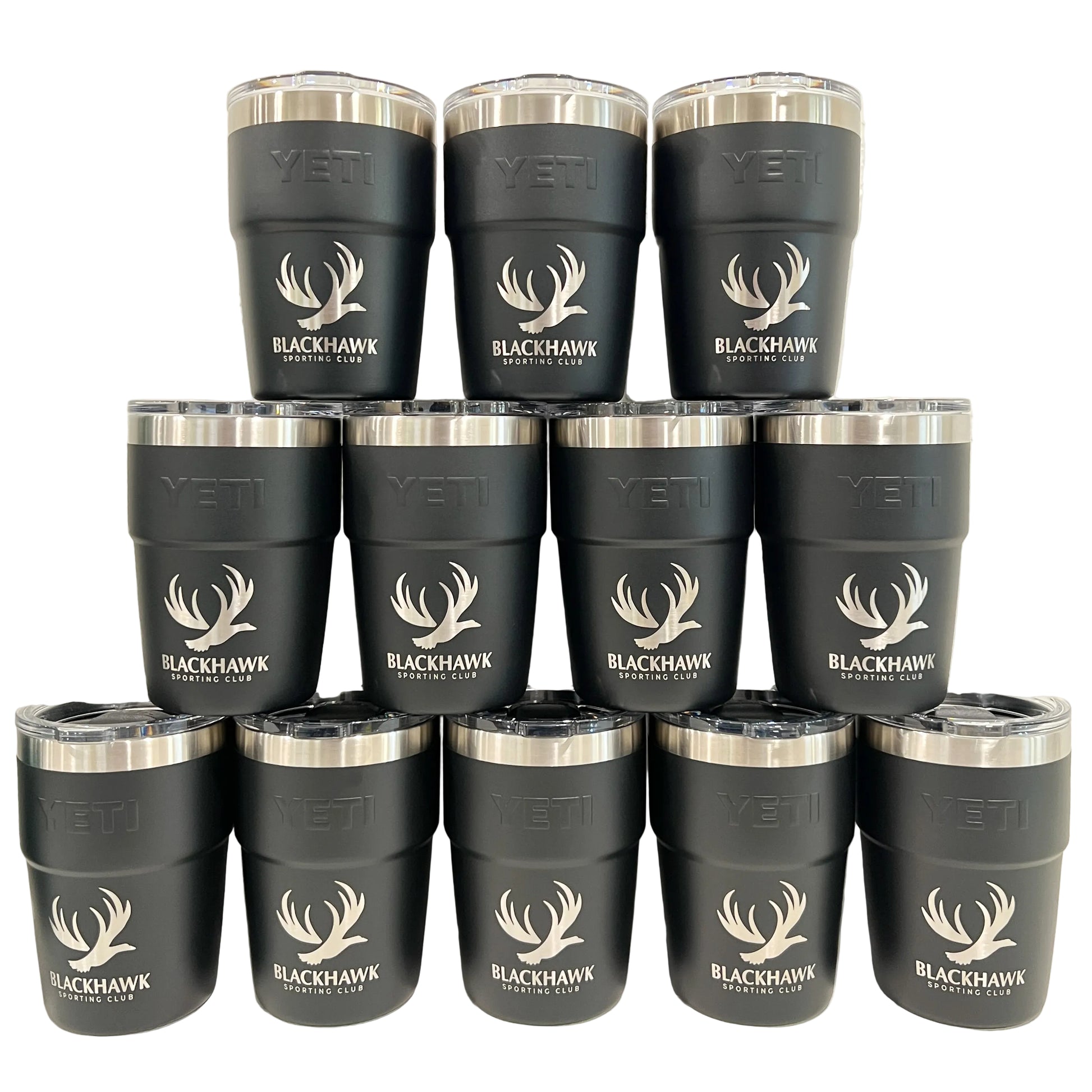Multiple black Yeti tumblers with Blackhawk Sporting Club logo on a white background