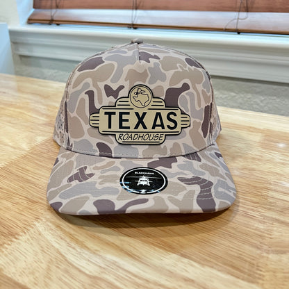 Gray and brown camo Zapped Blackhawk cap with a 'TEXAS ROADHOUSE' patch