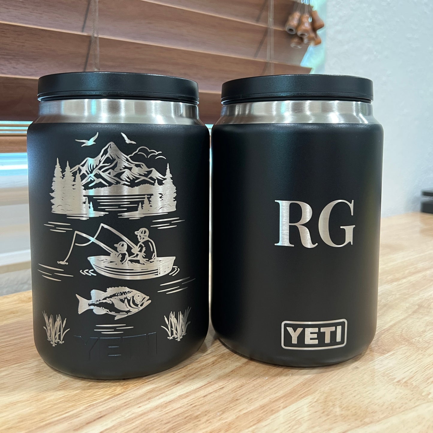 Black YETI Food Jar with engraved design on a wooden surface