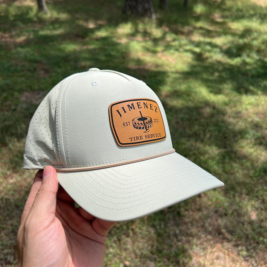 Light beige Richardson 355 rope hat with a brown leatherette patch