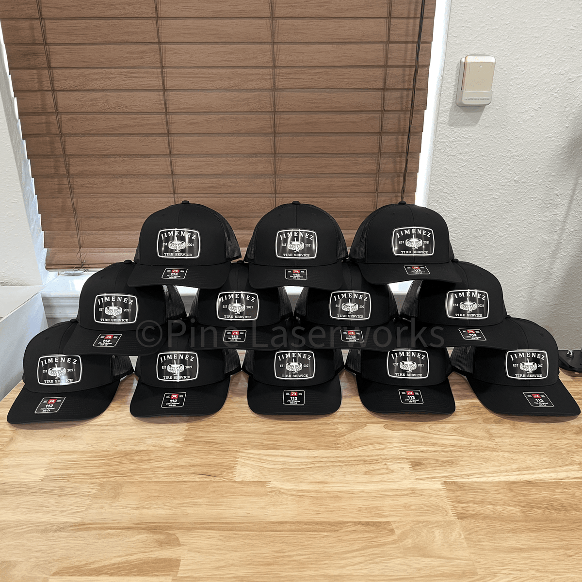 Group of black Richardson 112 caps with white and black 'Jimenez' acrylic patches