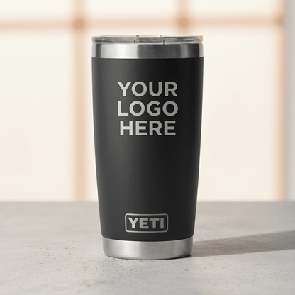 Black YETI tumbler with 'Your Logo Here' text on a white background