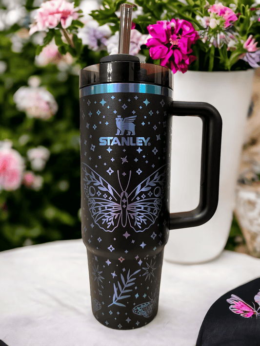 Butterfly Stanley 30oz H2.0 Flowstate Tumbler Black Chroma or Mint Color - Pine LaserworksStanley Chroma Collection 30oz tumbler fully engraved with large butterflies and sparkle effects. Beautiful finish and shine. color shift from green, pink and blue. Personalized stanley tumbler laser engraved.