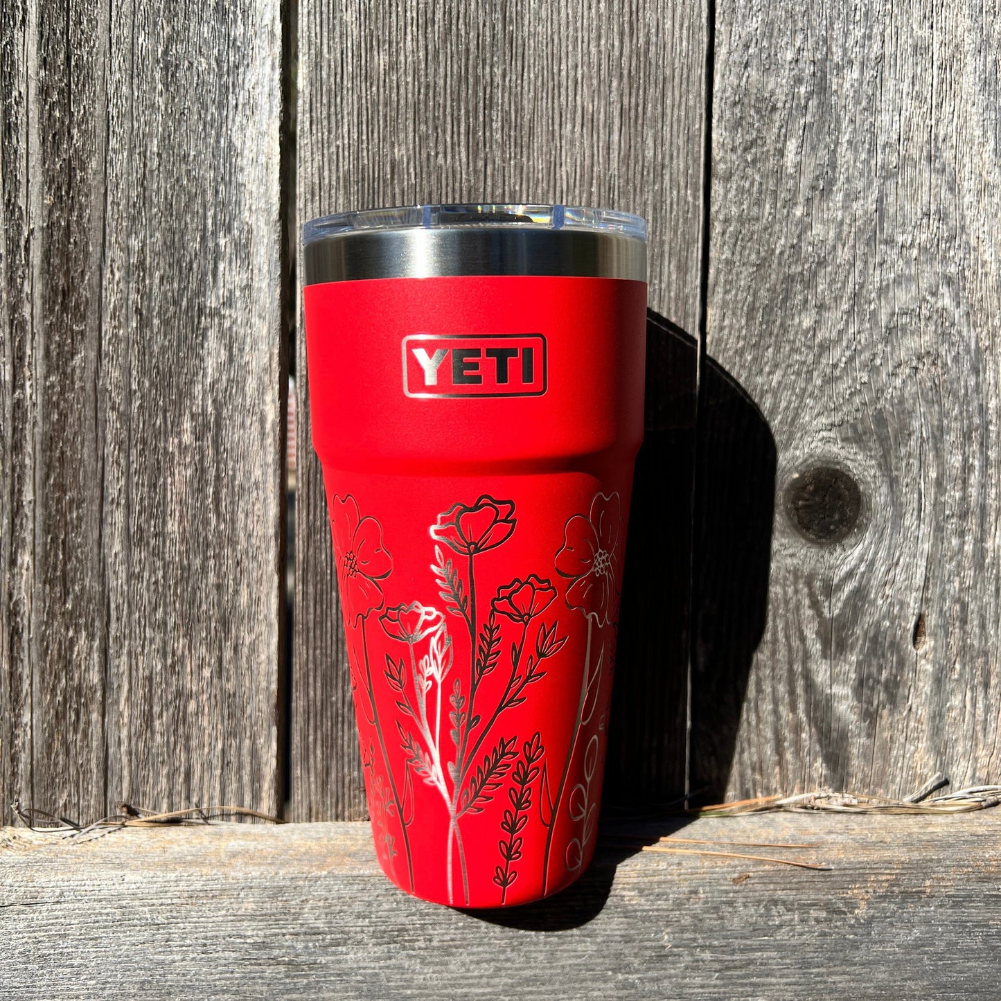 Floral Yeti 30oz Rambler Cup Full Custom Engrave - Pine LaserworksRed YETI mug with floral design on a wooden surface