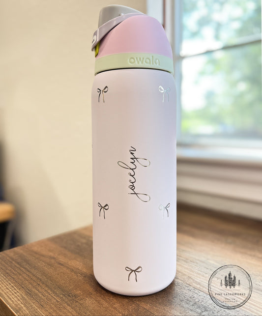 Personalized Bow Pattern Owala 32oz Freesip Water Bottle - Pine LaserworksBow Pattern Owala Freesip 32oz Water Bottle with Personalization. Custom Laser Engraved gift pinelaserworks.com