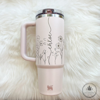 Personalized Floral Stanley ProTour 30oz or 40oz Engraved Tumbler - Pine LaserworksPink tumbler with floral designs and text on a white fluffy surface