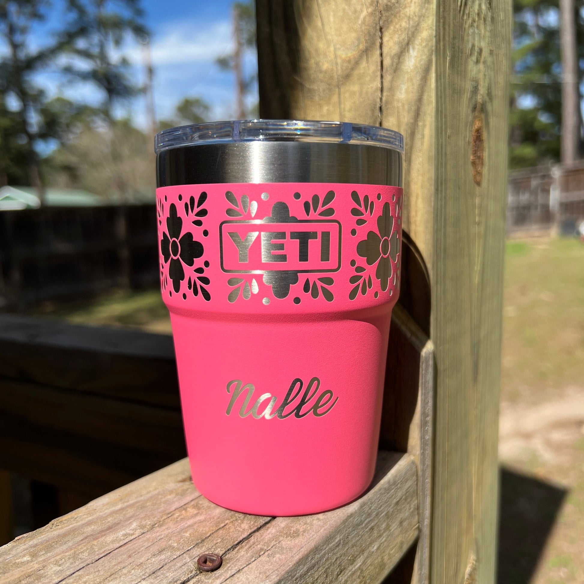 Personalized Talavera Flower Yeti 16oz Stackable Cup - Pine LaserworksTropical Pink YETI Tumbler with floral designs and 'Nalle' name on a wooden surface